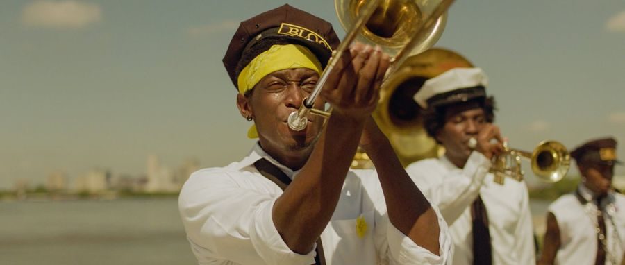 A brass band playing on a levee